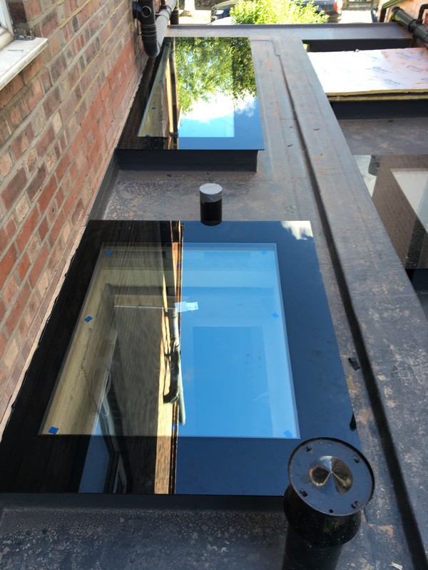 Multiple flat roof skylights on extension in Highbury